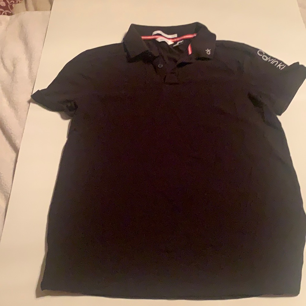 Men’s medium Calvin Klein navy shirt sleeve polo.
